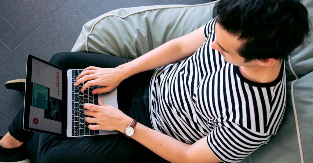 Photo Of Man Using Laptop